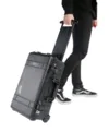 Peli 1510 case being pulled like a trolley suitcase.
